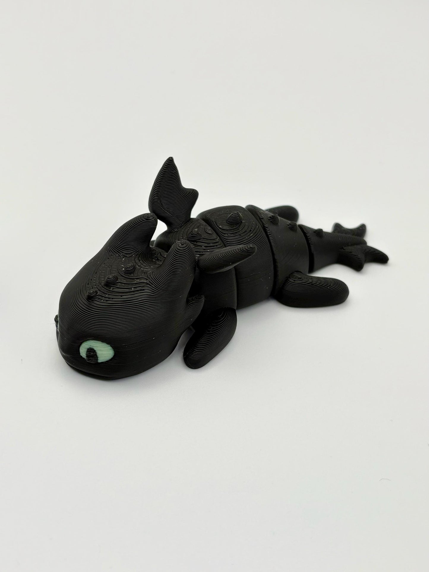 Baby Toothless Light Fury Fidget Toy with glow eyes